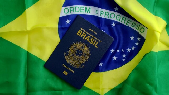 Brazilian Passport on the Flag: A symbol of national identity, the passport rests upon the vibrant flag of Brazil, evoking citizenship and pride.