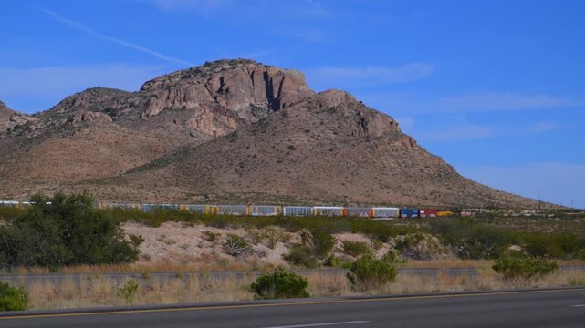 A Union Pacific train traversing the Animas Valley in New Mexico. The scene is located near the ghost town of Steins, specifically along the Lordsburg District of the Union Pacific Sunset Route. 