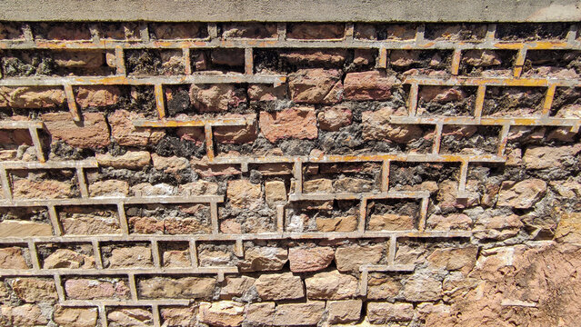 Vintage stone brick wall structure mid century art with cemented lines