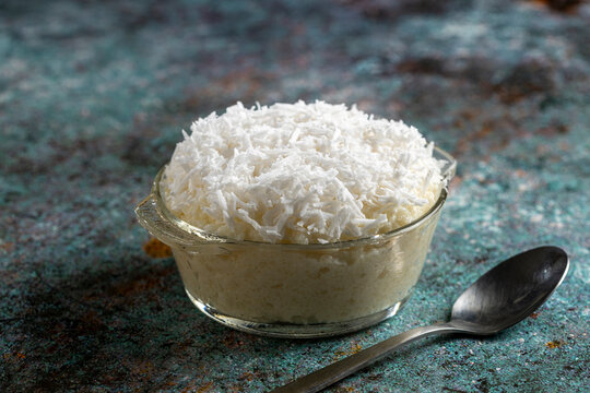Cuscuz - A traditional Brazilian dessert. A sweet tapioca pudding with coconut and condensed milk.