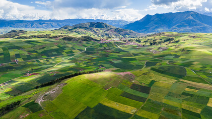Aerial view of the cultivated fields and mountains of the villages of Cusco, Peru © JuanLuis