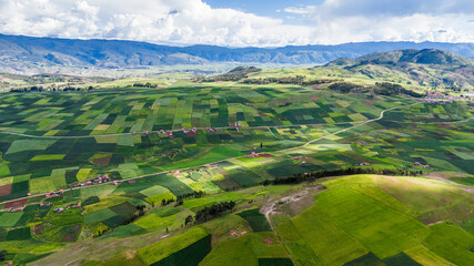 Aerial view of the cultivated fields and mountains of the villages of Cusco, Peru © JuanLuis