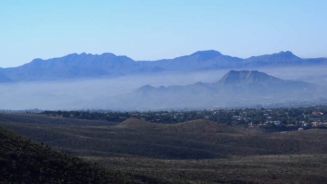 This view overlooks El Paso, Texas, featuring residential areas nestled against the arid landscape.
