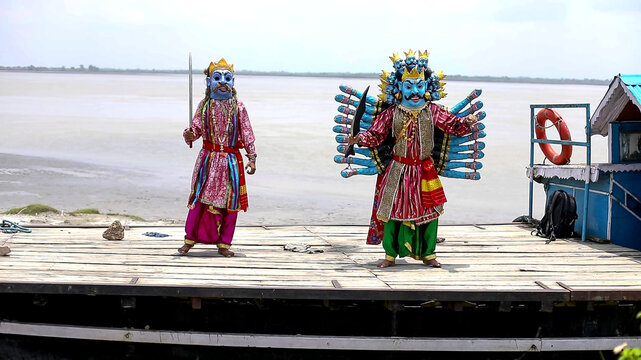 Traditional Masked Performers Dancing on Riverside Boat, Majuli Mukha Shilpa