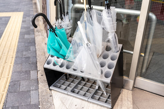 Umbrella stand outside of a shop in Kyoto Japan, gives a place for customers to store their umbrellas on a rainy day