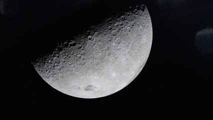 Surface of the Earth's moon in space. Satellite point of view. Cut out on black. NASA Public Domain Imagery © Marcin Janiec