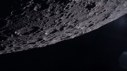 Gray dusty surface of the Earth's moon in space. Satellite point of view. Cut out on black. NASA Public Domain Imagery © Marcin Janiec
