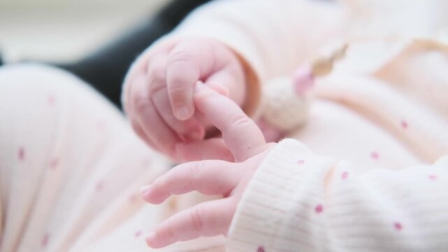 Tiny Newborn Baby Hands Interlocking and Playing with Fingers, Discovery of Self Concept, Sweet Infant Holding and Touching Own Hands, Concept of Innocence, Child Development, Early Childhood