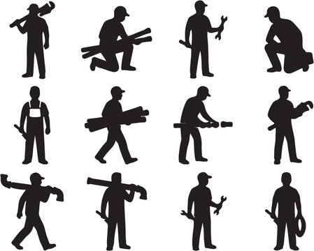 Silhouettes of construction workers carrying tools.