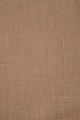 Fototapeta premium Seamless natural burlap fabric texture background with rustic woven linen pattern in warm brown tones.