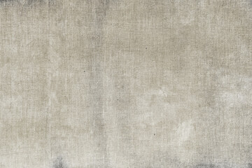 Fototapeta premium Vintage beige paper texture background with subtle grain, speckles, and natural aged surface detail.