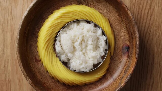 Placing Sticky Rice Into Plate Top View Close Up
