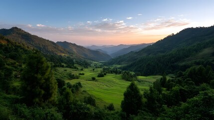 Fototapeta premium An expansive landscape of rolling green hills and valleys viewed under a dramatic morning or evening sky