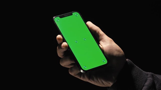 Smartphone Green Screen In Hand Mockup