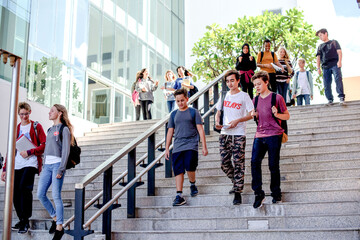 Obraz premium Students descending outdoor staircase photo
