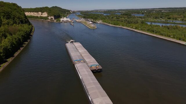 Barge sailing on the Albert Canal near the Ecluse de Lanaye on the Maas river between Belgium and Netherlands