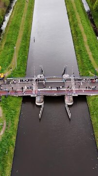 Aerial View Of Bascule Bridge Opening And Closing Over Canal