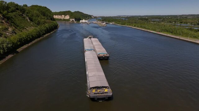 River lock on the Maas with barge sailing on the Albert Canal near Ecluse de Lanaye