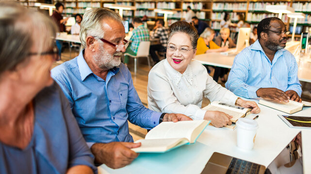 Diverse group reading together photo