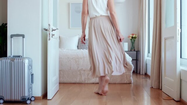 Holiday, fun and legs on bed with jump, travel optimism and happiness on summer getaway. Tourist, trip or woman feet in hotel room with good time, vacation enjoyment or playful energy in bedroom.