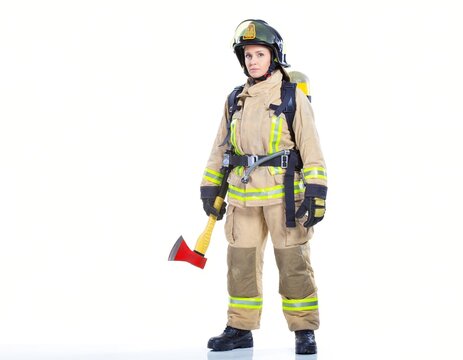 Female firefighter in protective gear with axe isolated on white