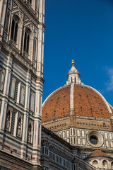 Fototapeta premium Florence Cathedral and Giotto Bell Tower under blue sky in Florence, Italy