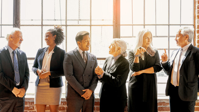 Diverse professionals engaged in discussion