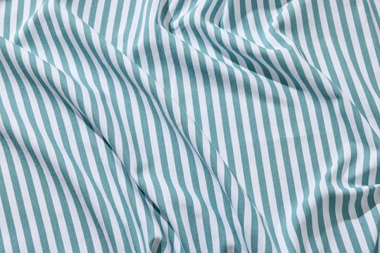 Blue and White Striped Linen Tablecloth Texture Background. Top View