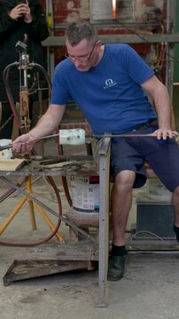 Murano Glass Master Shaping Molten Glass Inside Venetian Glass Factory