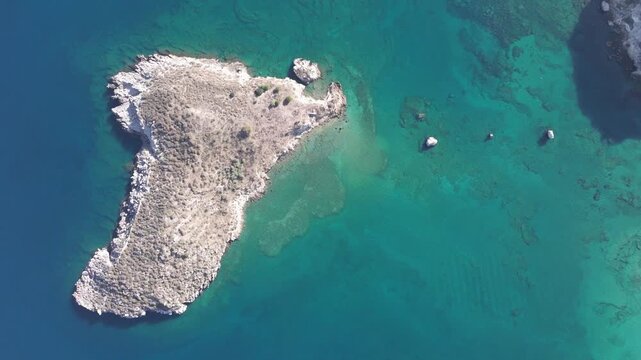 Aerial drone shot.View of famous beach in the summer, Crete, Greece. Famous beach with river and palm trees in Libyan sea. Tropical island, Panoramic view, Most beautiful beaches of Crete island