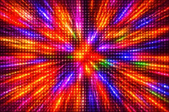 Vibrant disco ball lights create a dazzling, energetic explosion of color and motion