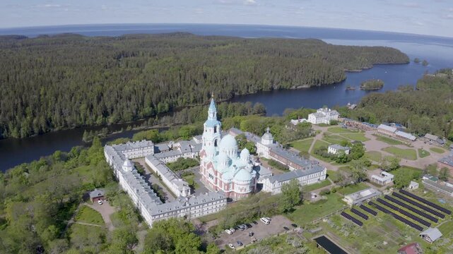 Orbital aerial shot of Valaam Monastery and Ladoga lake on sunny summer day. Karelia, Russia.
