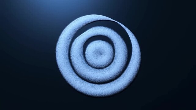 Slow motion top down static shot of rotating concentric particle spiral forming rings on dark studio surface