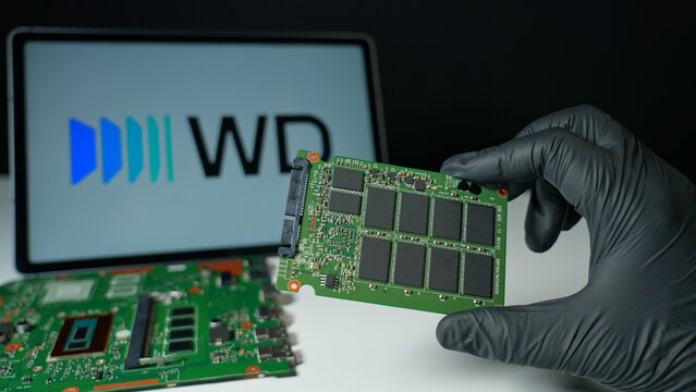 Western Digital background, display of the internal SSD Solid Stat Drive for computers and cloud data storage. WD world's largest manufacturers of HDD and SSD: Toronto, Ontario, Canada - May 9, 2026