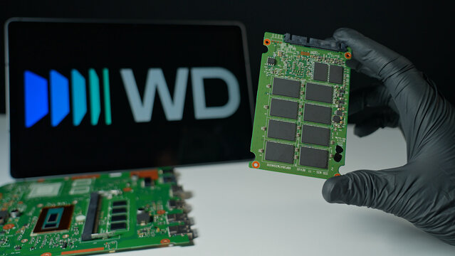Western Digital background, display of the internal SSD Solid Stat Drive for computers and cloud data storage. WD world's largest manufacturers of HDD and SSD: Toronto, Ontario, Canada - May 9, 2026
