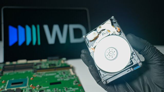 Display of the HDD hard drive for cloud data storage with Western Digital background. WD world's largest manufacturers of Hard Disk Drives and SSD memory : Toronto, Ontario, Canada - May 9, 2026