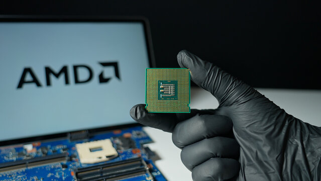 Advanced Micro Devices AMD background display, American semiconductor company, designs high-performance CPUs, GPUs, FPGAs, and adaptive computing solutions : Toronto, Ontario, Canada - May 9, 2026