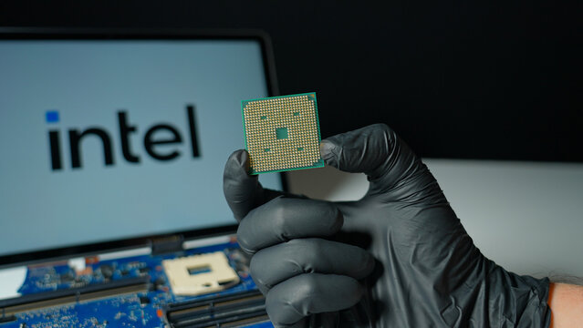 Intel Corporation background display, leading global designer and manufacturer of semiconductor products and microprocessors CPU and collaborating on AI boom: Toronto, Ontario, Canada - May 9, 2026
