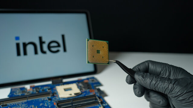 Intel Corporation background display, leading global designer and manufacturer of semiconductor products and microprocessors CPU and collaborating on AI boom: Toronto, Ontario, Canada - May 9, 2026