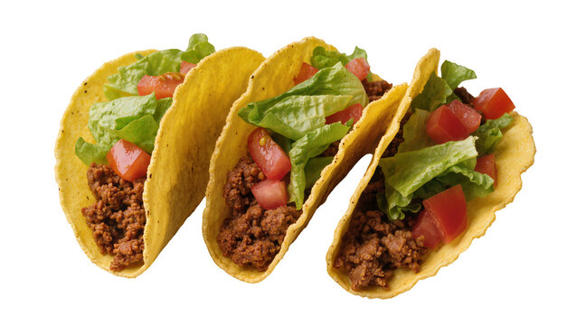 Isolated three crunchy hard shell tacos with ground beef, fresh lettuce and diced tomatoes