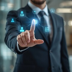 Obraz premium A businessman in a suit pointing at a glowing holographic user interface showing connected icons of people and data storage