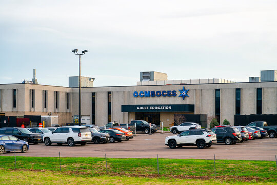 Liverpool, NY - Apr 14, 2026: Exterior of the OCM BOCES Adult Education Center providing workforce training and continuing education services located at 110 Elwood Davis Road, Liverpool, NY 13088