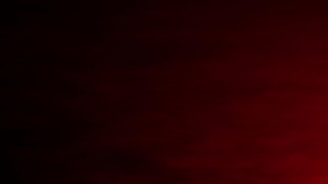 Realistic red smoke fog, rolling cinematic vapor from bottom left, isolated black background overlay, warm fire aftermath haze, atmospheric drifting cloud for moody transitions, ambient 4k video