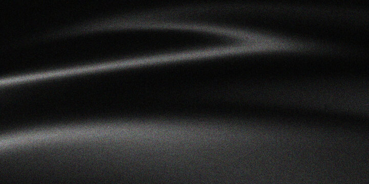 A dark textured black fabric background with a smooth silk and satin pattern surface, creating a rough leather-like textile backdrop for modern fashion design