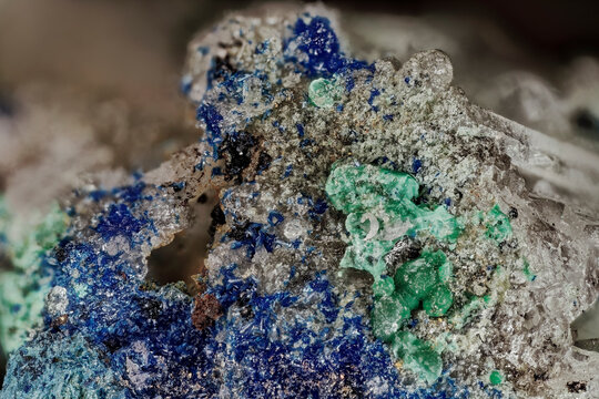 Macro of malachite veinlets and azurite on quartz from Altai, Russia. Detailed vein-fill morphology of secondary copper minerals with limonite and tenorite