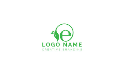 Fototapeta premium Green letter e eco logo design featuring organic leaf element, environment