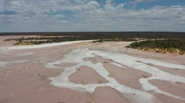 rising drone view of salt lake bushland, Lake Deborah, Outback, Video, Western Australia