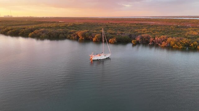 Garden Island and Torrens Island, North Adelaide, South Australia &ndash; 4K Aerial Drone Footage of Mangrove Wetlands, Kayaking Trails, Port River Estuary, Ships Graveyard, high-voltage lines at Sunset