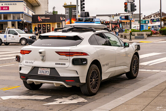 Waymo self-driving car operating on city streets in San Francisco