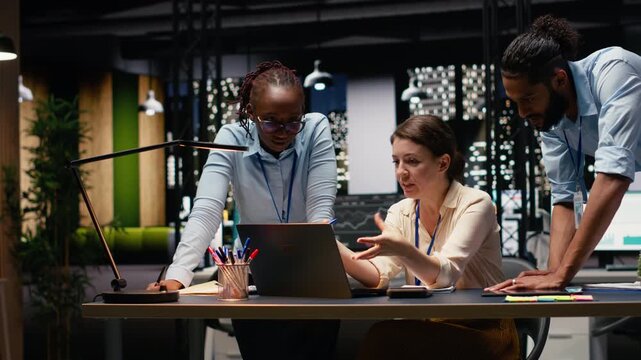 Multiethnic group of consultants uniting forces to solve project tasks together, guaranteeing success for a growth strategy. Following an action plan to increase profit, data forecast.